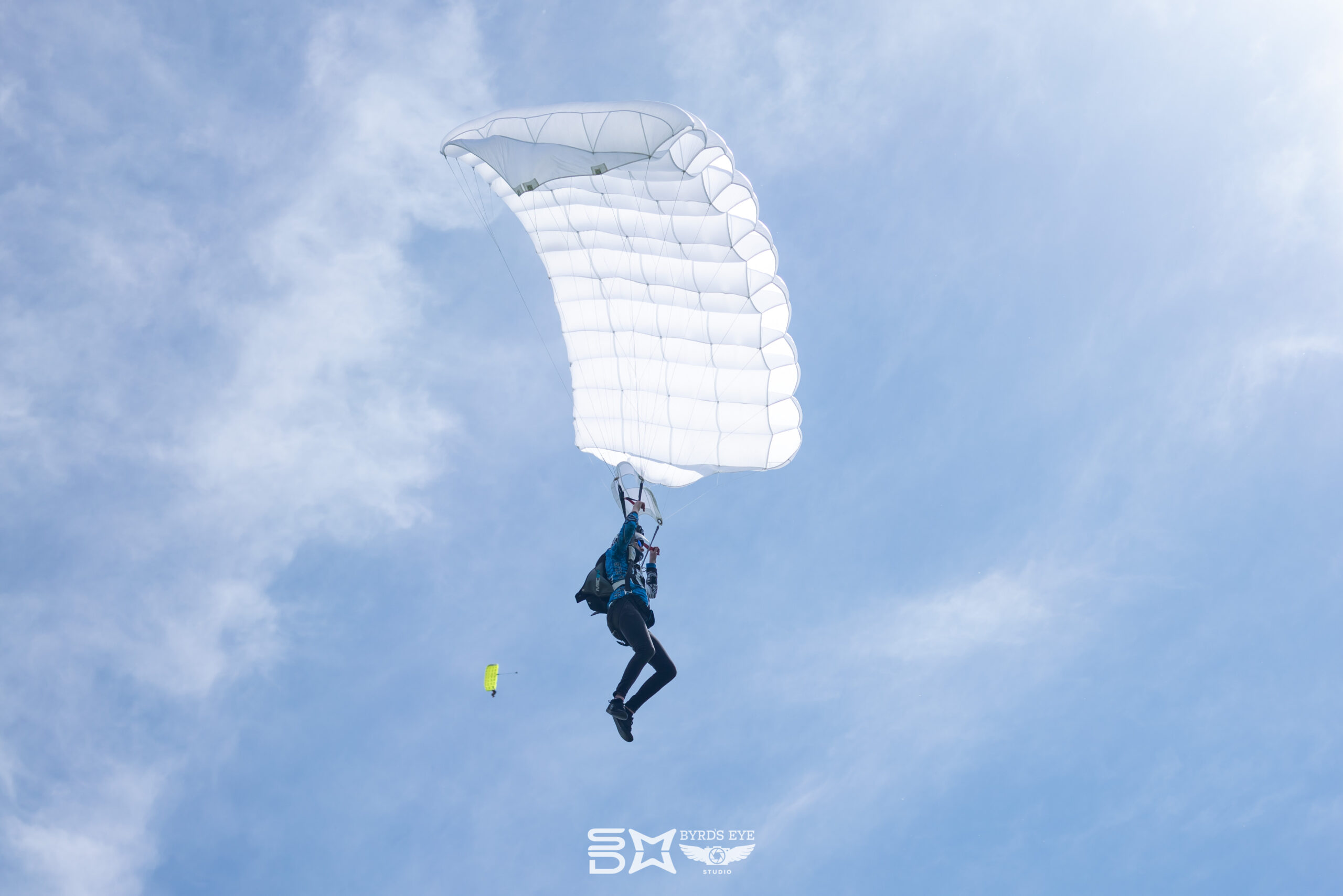 Skydiver flying a reserve parachute